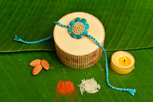 Turquoise Golden Florak Embroidery Rakhi with Roli Chawal